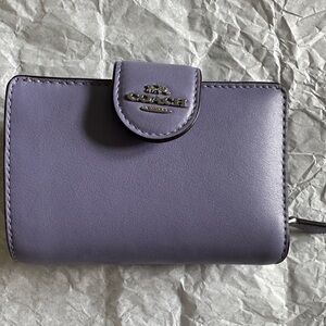 Light violet corner zip Coach outlet wallet